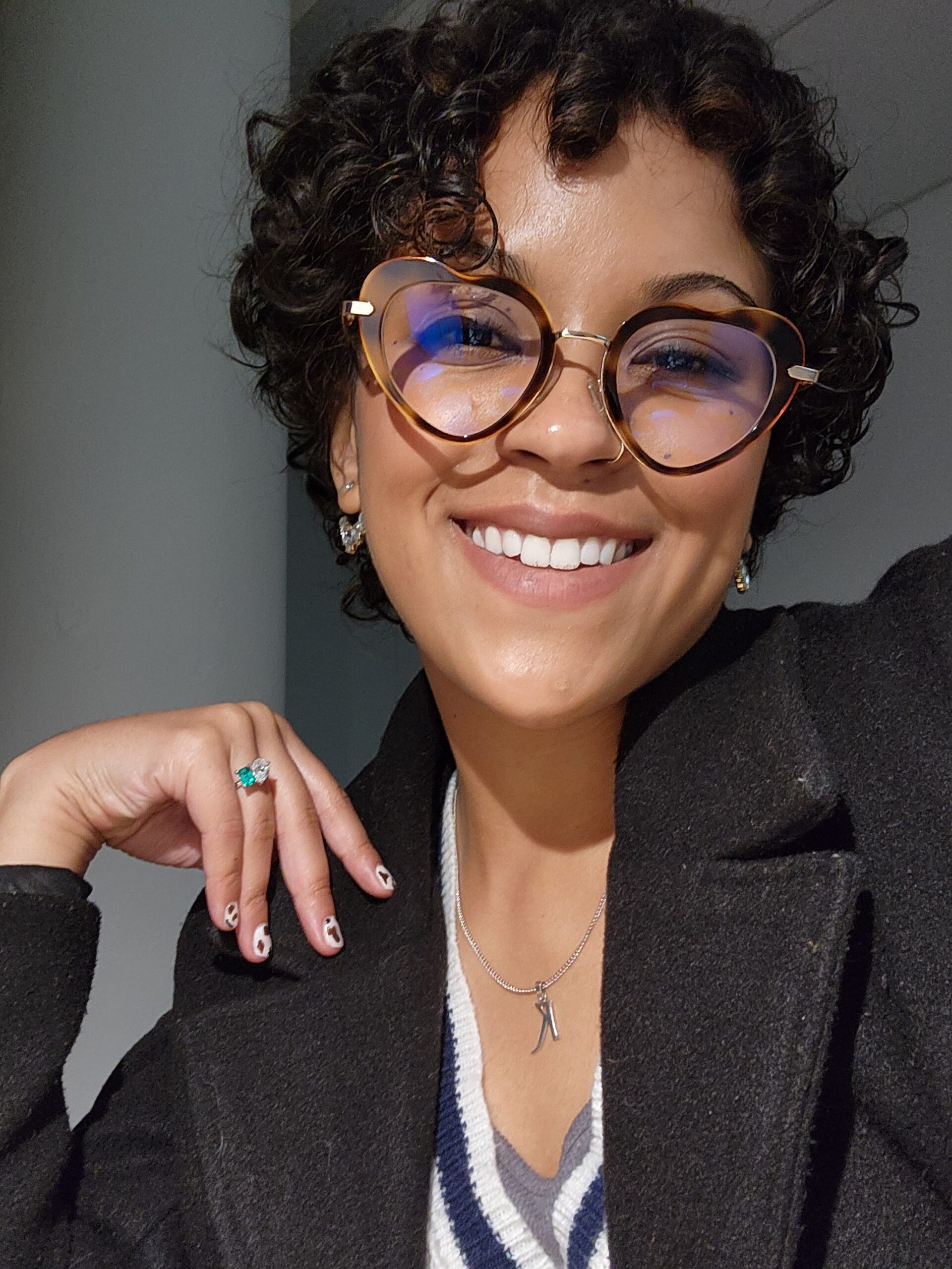 Woman with glasses, smiling